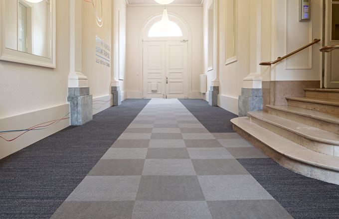 Tile matting shown in two of our Trilogy Tile® colorways available at Mats Inc.